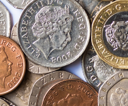 An image of pound coins representing financial support
