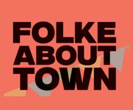 The words Folke About Town in black on an orange background with some bunting