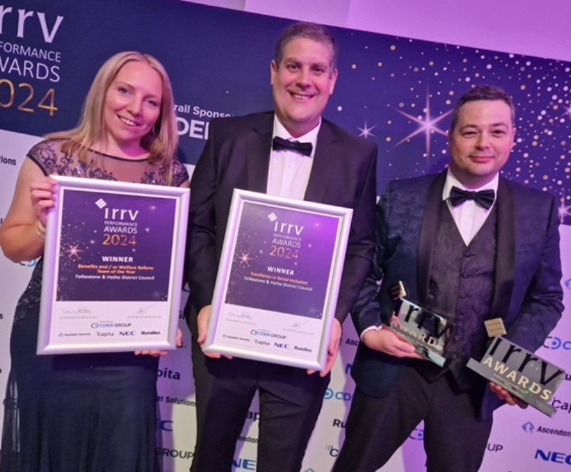 Three members of council staff pose with the IRVV Awards.