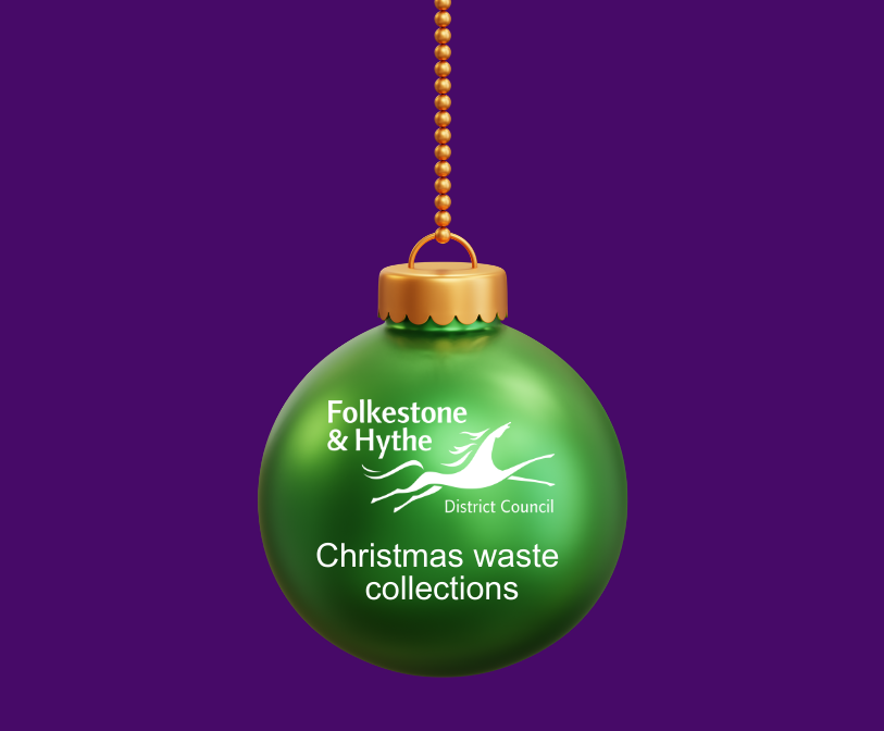 A green Christmas bauble with the Folkestone &amp; Hythe District Council logo on a purple background