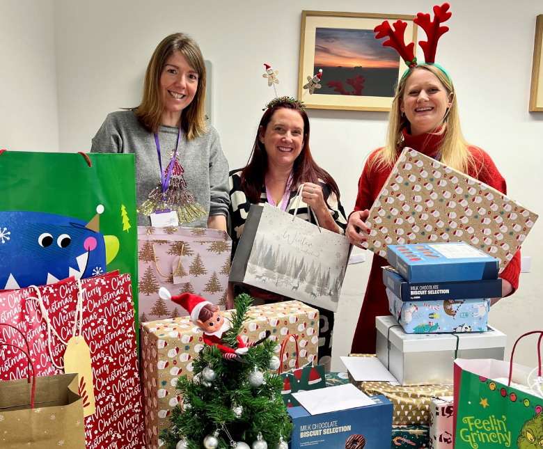 An image of FHDC staff Caroline, Tracey and Jo feeling festive with the donated presents