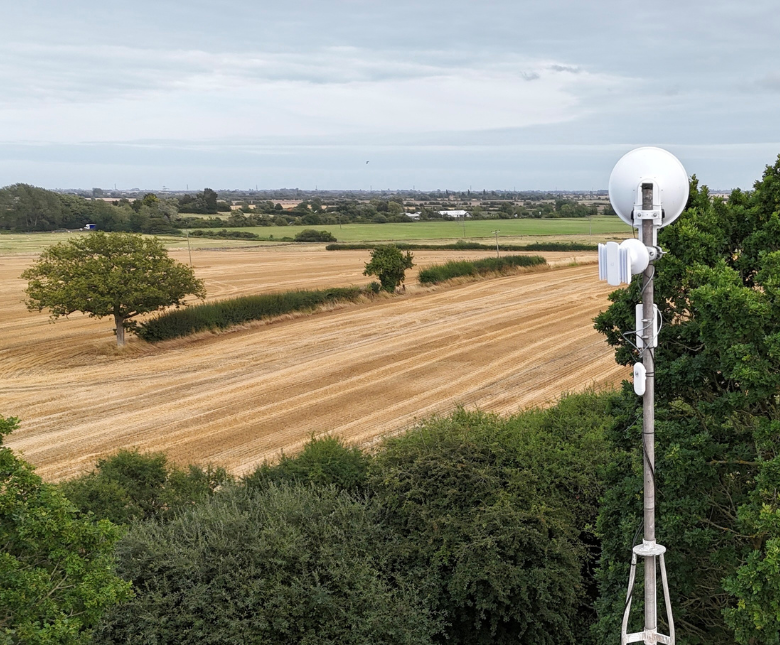 An image of the Romney Marsh countryside with a broadband antenna in view