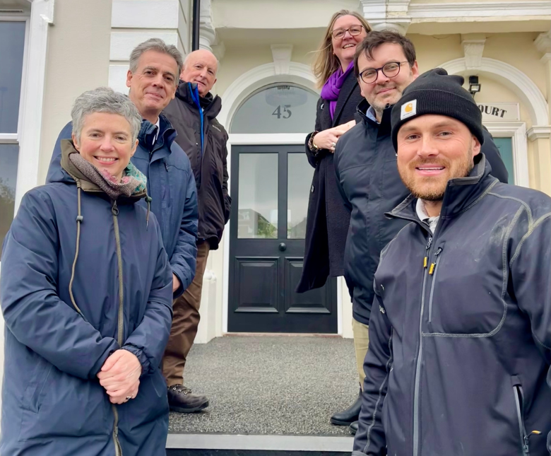 The people pictured in the image from left to right (front to back) are, Cllr Rebecca Shoob – F&HDC Cabinet Member for Housing and Homelessness, Steve Grimshaw – NUE Strategic Programme Manager and NUE lead, Derek Murphy – KCC Cabinet Membe